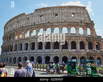 Rickshaws and tourists in front of the Colosseum Rome Lazio Italy Europe Stock Photo