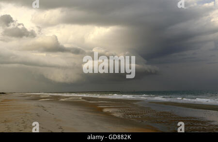 A thunderstorm rolls across a South Carolina beach. Stock Photo