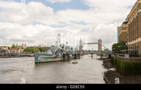 HMS Belfast and Tower Bridge viewed from the South Bank of The Thames, London. Stock Photo