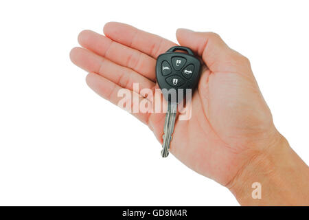 Hand the car keys on isolate white background Stock Photo