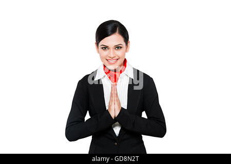 1 Indian Adult Woman Air Hostess standing Joined Hands Welcome Stock Photo