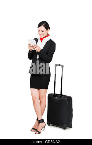 1 Indian Adult Woman Air Hostess Dialing Mobile Phone Stock Photo