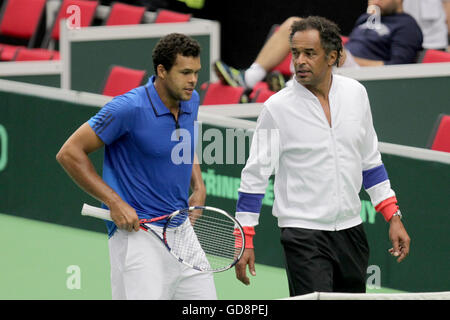Trinec, Czech Republic. 13th July, 2016. French tennis player Jo-Wilfried Tsonga (left) and non-playing captain Yannick Noah during the training session prior to the Davis Cup quarterfinal match against Czech Republic in Trinec, Czech Republic, July 13, 2016. Credit:  Petr Sznapka/CTK Photo/Alamy Live News Stock Photo