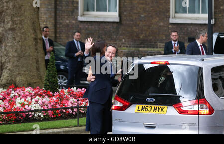 London, UK. 13th July, 2016. British outgoing Prime Minister David Cameron waves as he leaves 10 Downing Street in London, Britain on July 13, 2016. Cameron bid farewell to 10 Downing Street and headed to Buckingham Palace to offer his resignation to Queen Elizabeth II on Wednesday afternoon. Credit:  Han Yan/Xinhua/Alamy Live News Stock Photo