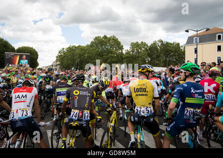 Carcassonne, France. 13th July, 2016. Riders wait to begin the 'depart fictif' - the procession through Carcassonne before the official start in Villalier. Credit:  John Kavouris/Alamy Live News Stock Photo