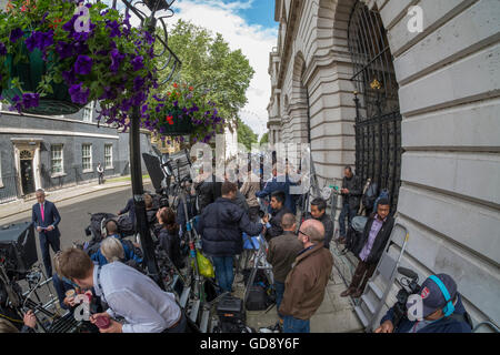Downing Street, London, UK. 13th July 2016. International news media gather in Downing Street awaiting Former Prime Minister David Cameron to give his farewell speech before departing and new PM Theresa May to arrive. Credit: Malcolm Park/Alamy Live News. Stock Photo