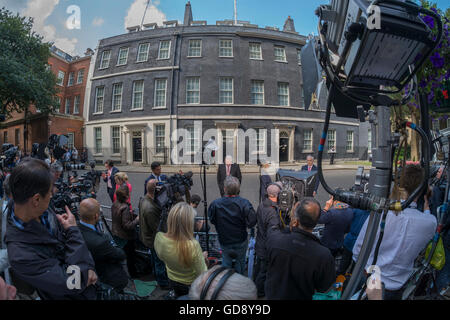 Downing Street, London, UK. 13th July 2016. International news media gather in Downing Street awaiting Former Prime Minister David Cameron to give his farewell speech before departing and new PM Theresa May to arrive. Credit: Malcolm Park/Alamy Live News. Stock Photo