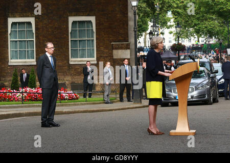 London, UK. 13th July, 2016. Prime Minister Theresa May makes her arrival speech at Number 10 Downing Street. Husband Philip is behind her. Theresa May has officially become the new Prime Minister after meeting with HM Queen Elizabeth II at Buckingham Palace. Theresa May becomes the second woman Prime Minister in Great Britain, Margaret Thatcher was the first. David Cameron left Number 10 Downing Street with wife Samantha and their children, a short while earlier.  Credit:  Paul Marriott/Alamy Live News Stock Photo