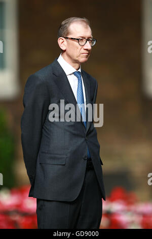 London, UK. 13th July, 2016. Philip May, husband of Prime Minister Theresa May, watches as she makes her arrival speech at Number 10 Downing Street. Theresa May has officially become the new Prime Minister after meeting with HM Queen Elizabeth II at Buckingham Palace. Theresa May becomes the second woman Prime Minister in Great Britain, Margaret Thatcher was the first. David Cameron left Number 10 Downing Street with wife Samantha and their children, a short while earlier.  Credit:  Paul Marriott/Alamy Live News Stock Photo
