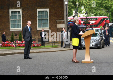 London, UK. 13th July, 2016. Philip May watches with a smile on his face as his wife, Prime Minister Theresa May, makes her arrival speech at Number 10 Downing Street. Theresa May has officially become the new Prime Minister after meeting with HM Queen Elizabeth II at Buckingham Palace. Theresa May becomes the second woman Prime Minister in Great Britain, Margaret Thatcher was the first. David Cameron left Number 10 Downing Street with wife Samantha and their children, a short while earlier.  Credit:  Paul Marriott/Alamy Live News Stock Photo