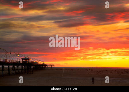 Southport, Merseyside, UK. 13th July, 2016. UK Weather: A stunning sunset grazes over Southport Pier as another summer day comes to an end.  The unsettled UK weather continues late into the week with more heavy rain downpours forecast. Credit:  Cernan Elias/Ģ����ý Live News Stock Photo