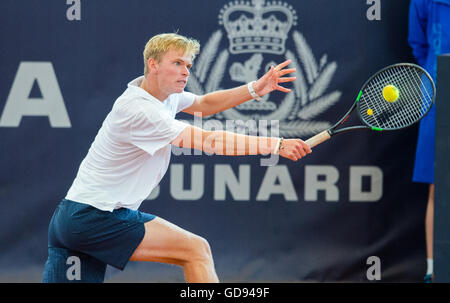 Hamburg, Germany. 14th July, 2016. Louis Wessels of Germany plays against Klizan of Slovakia during a round of 16 match at the ATP Tour - German Tennis Championships at the Am Rothenbaum tennis court in Hamburg, Germany, 14 July 2016. Photo: DANIEL BOCKWOLDT/dpa/Alamy Live News Stock Photo