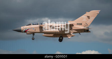 Farnborough, Hampshire UK. 14th July 2016. Day 4 of the Farnborough International Trade Airshow. Visiting RAF Tornado GR4 painted in Gulf War Desert Pink with a livery celebrating 25 years of combat operations touches down. Credit:  aviationimages/Alamy Live News.