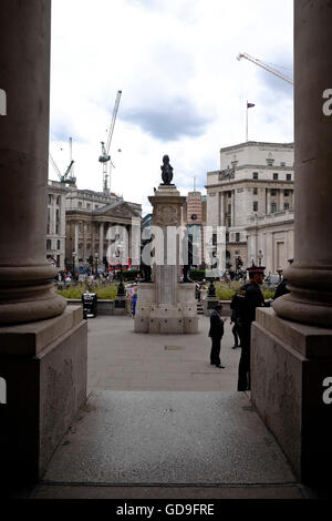 London, United Kingdom. The Old Stock Exchange building in London's CBD area The London war memorial visible with cranes and construction in the back Stock Photo