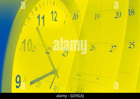 Clock face and calendar pages Stock Photo