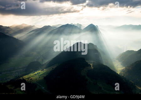 Mountains, Landscape with sun rays in haze on Kanisfluh, seen from the Diedamskopf, near Mellau in the Bregenz Forest Stock Photo