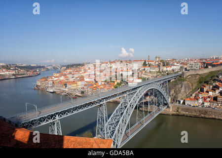 Porto cityscape and skyline in Portugal, Dom Luiz I Bridge over Douro River, historic city center, UNESCO World Heritage Site Stock Photo