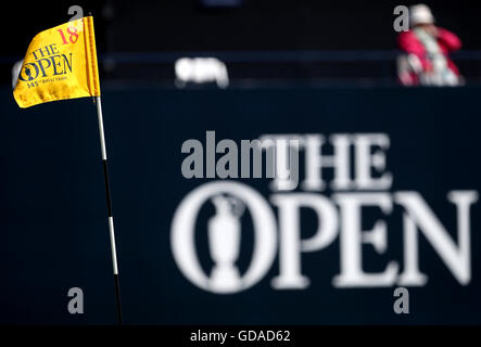 A view of the flag on the 18th hole during day one of The Open Championship 2016 at Royal Troon Golf Club, South Ayrshire. PRESS ASSOCIATION Photo. Picture date: Thursday July 14, 2016. See PA story GOLF Open. Photo credit should read: Peter Byrne/PA Wire. RESTRICTIONS: Editorial use only. No commercial use. Still image use only. The Open Championship logo and clear link to The Open website (TheOpen.com) to be included on website publishing. Call +44 (0)1158 447447 for further information. Stock Photo