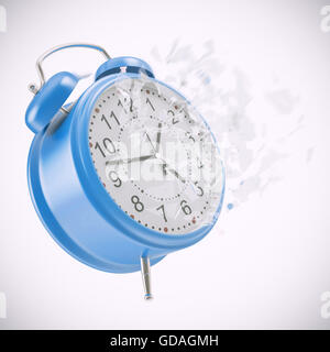 Soaring Clock alarm clock with broken glass shattered into small pieces. Stock Photo