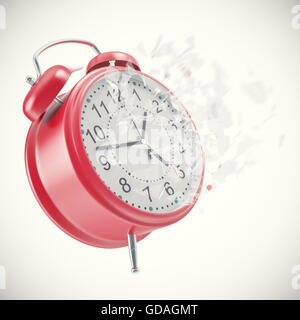 Soaring Clock alarm clock with broken glass shattered into small pieces. Stock Photo