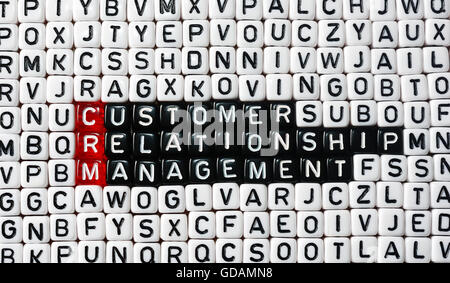 CRM Consumer Relationship Management  written  on dices Stock Photo
