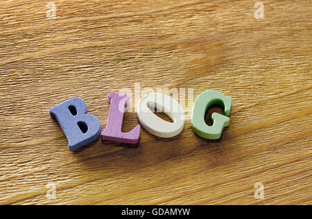 BLOG  - word made from multicolored child toy  letters on wooden  background Stock Photo