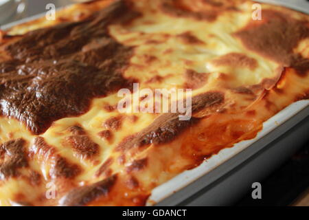 Homemade lasagne, home cooking, homemade cheese sauce, bolognese sauce, mince, onions, peppers, garlic, Italian food Stock Photo