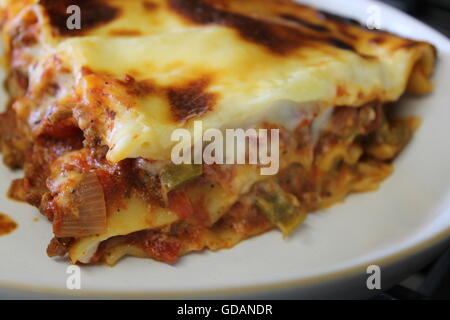 Homemade lasagne, home cooking, homemade cheese sauce, bolognese sauce, mince, onions, peppers, garlic, Italian food Stock Photo