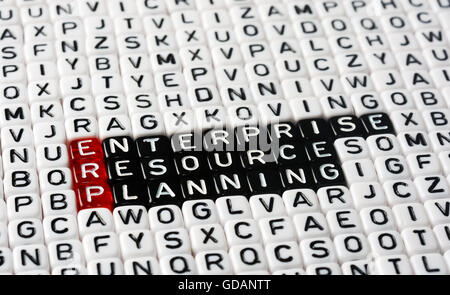 ERP Enterprise Resource Planning writen on black and white dices Stock Photo