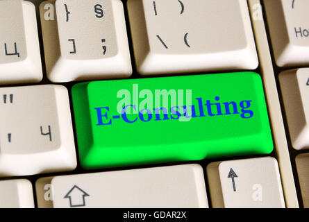 Green  e  consulting button on white keyboard Stock Photo