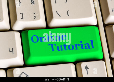 Education concept: Written word Online Tutorial on green  keyboard button. Stock Photo