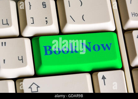 Book Now   on computer keyboard -  online booking concept Stock Photo