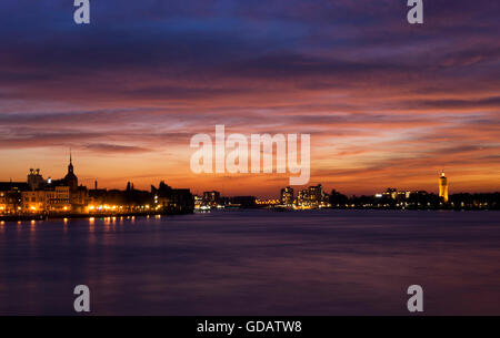 Spectacular sunset above the skylines from Dordrecht and Zwijndrecht Stock Photo