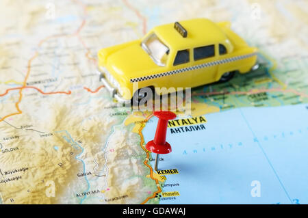 Close up of  Kemer,Turkey  map with red pin and a taxi    - Travel concept Stock Photo