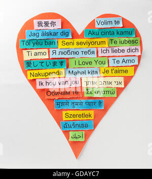 I Love You   Word Cloud printed on colorful paper in different languages on heart shape Stock Photo