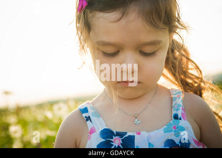 Portrait of five years old caucasian child girl sunset Stock Photo