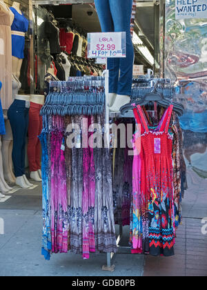 Very inexpensive summer dresses for sale at Lola's on Junction Boulevard in Corona Queens, New York. 6/24/2016. Stock Photo