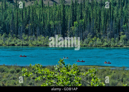 canoeists on Yukon river,Canada Stock Photo
