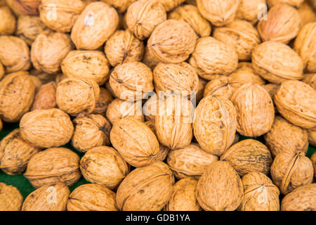 Close up on Pile of walnuts in their shells Stock Photo
