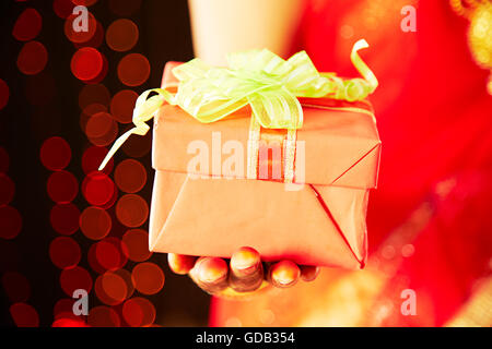 1 indian Adult Woman Bride Diwali Festival Hand Gift Showing Stock Photo