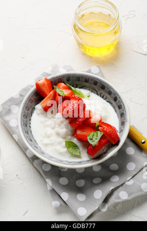 rice breakfast bowl with strawberry, healthy food Stock Photo