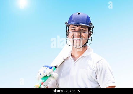 1 Indian Young man Cricketer Holding Bat Playing Cricket Sports Game Stock Photo