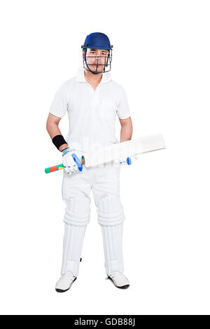 1 Indian Young Man sports Player Playing Cricket And Holding bat Stock Photo