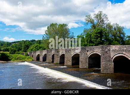 The old arched bridge over the River Usk, in Crickhowell, Powys, Wales UK Stock Photo