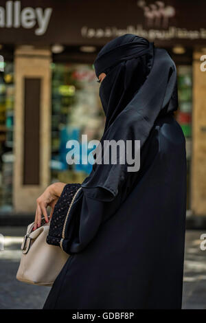 Muslim Woman in Beige Hijab and Traditional Clothes Praying for Allah ...