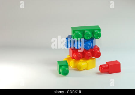 A stack of colorful plastic building blocks. Stock Photo