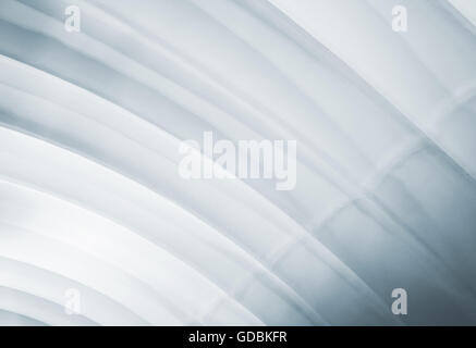 Abstract architecture background, white arched ceiling with soft illumination, blue toned photo Stock Photo