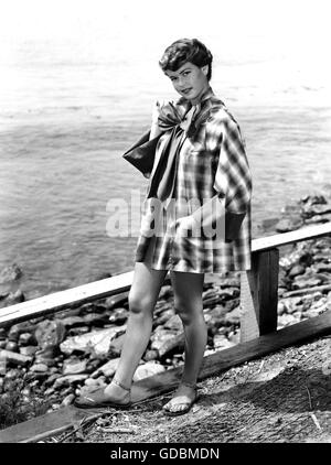 fashion, 1950s, beach fashion, young woman in swimsuit with headscarf ...