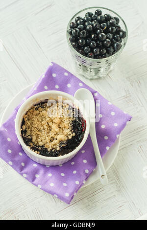 Blueberry crumble, pie, in a small dish. Stock Photo