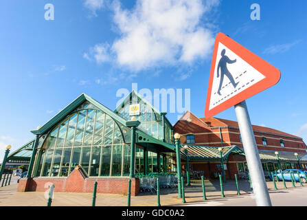 View of the front of a large modern Morrison's Supermarket photographed against a bright blue sky in Blackpool, Lancashire, UK Stock Photo